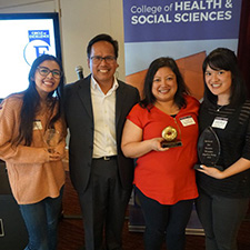 Dean Alvarez with three winners of 2018 awards