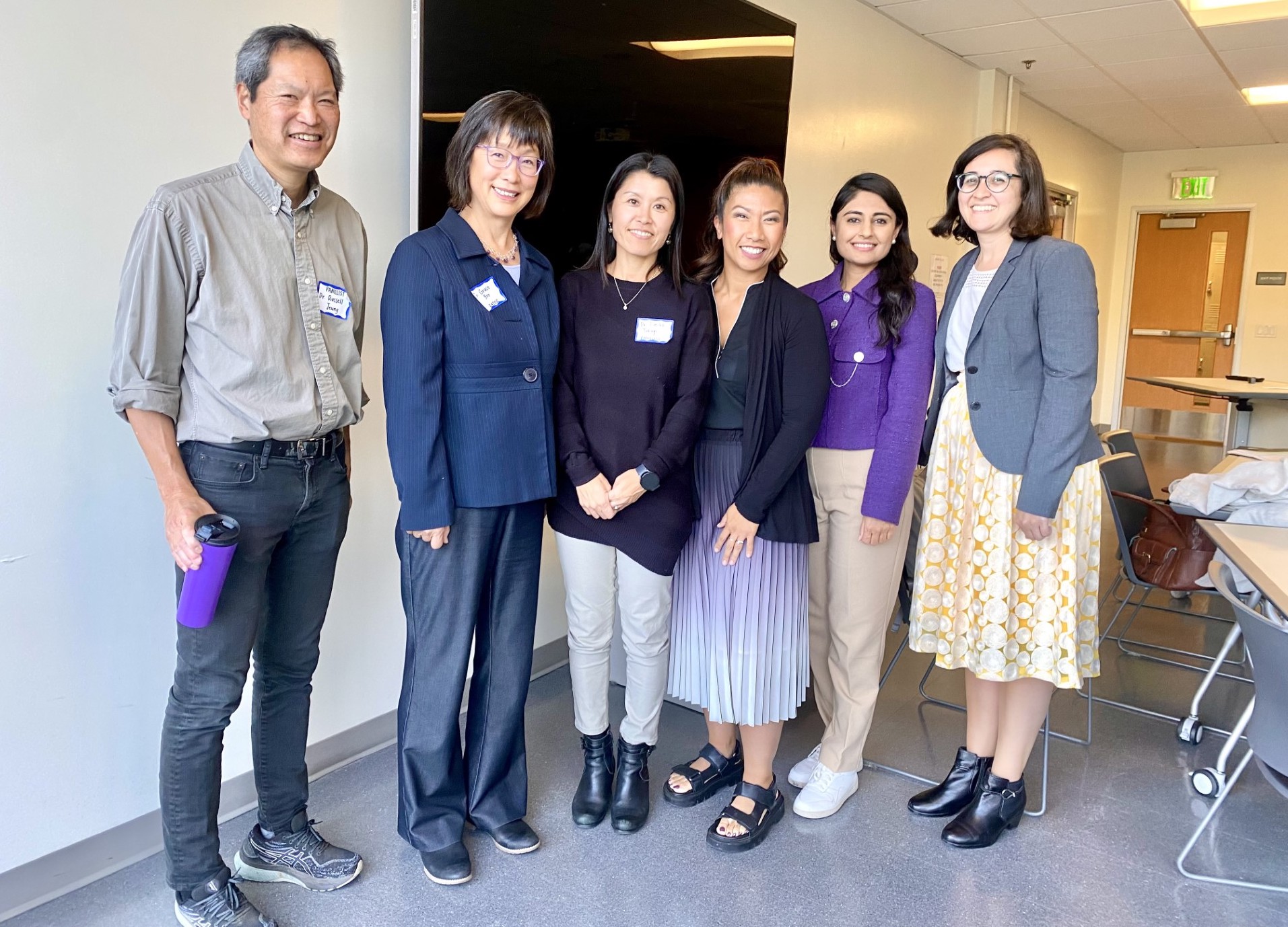 standing group of panelists at Asian Health Symposium at SF State
