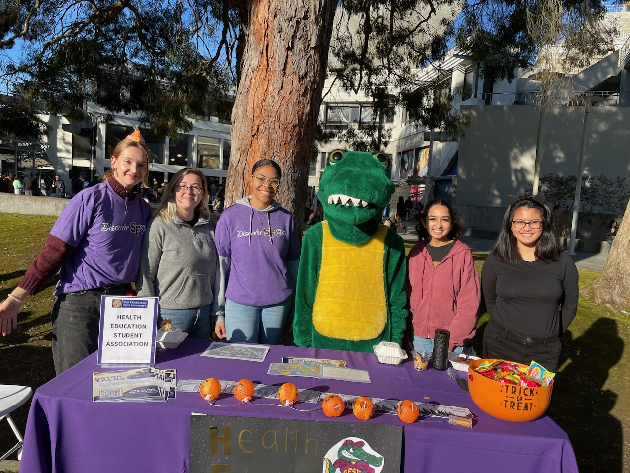 HESA group at table with gator