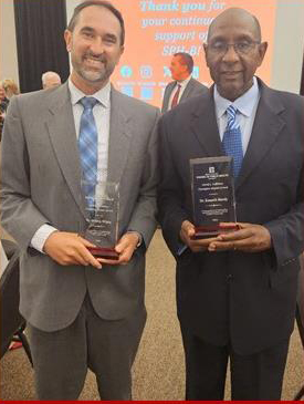 Jackson Wilson and Kenneth Mosely hold Indiana University alumni awards
