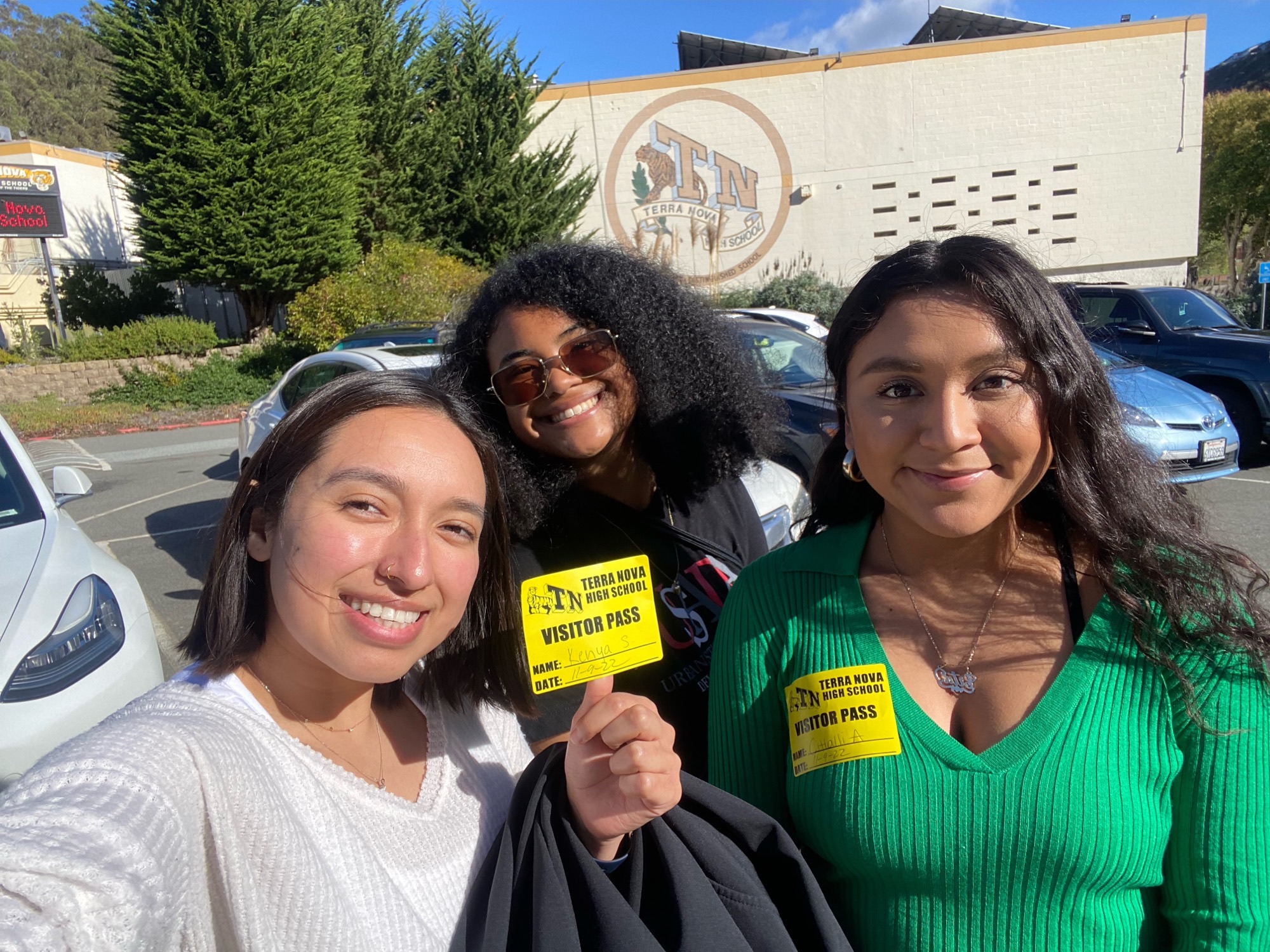 Makayla Wai-Lan Scott with classmates in front of Terra Nova High School