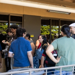 Students, faculty, and alumni conversing